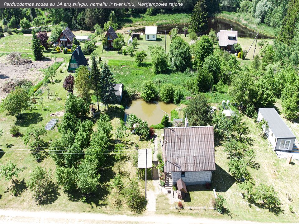Miškų apsuptyje, šalia ežero, parduodamas sodo sklypas su nameliu ir tvenkiniu, Paežerio g., Mačiuliškių k., Marijampolės sav.